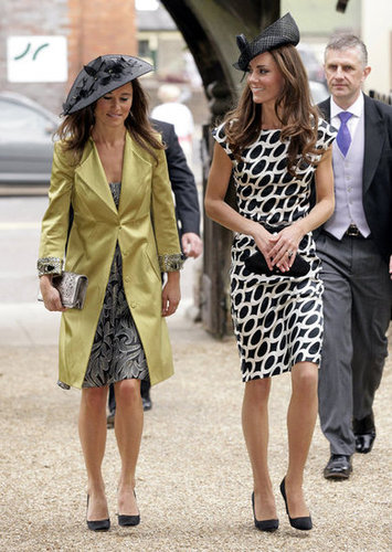 Kate and sister Pippa stepped out in sweet printed sheaths for a family friend's wedding.
Kate and sister Pippa stepped out in sweet printed sheaths for a family friend's wedding.