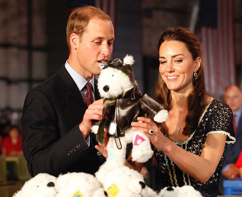 The couple helped pack care packages for military children at the Mission Serve: Hiring Our Heroes event in July 2011. She wore a crochet-detailed Whistles top.
The couple helped pack care packages for military children at the Mission Serve: Hiring Our Heroes event in July 2011. She wore a crochet-detailed Whistles top.