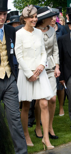 Kate was the picture of derby elegance in a white Reiss skirt suit. To accessorize, she added LK Bennett shoes and an LK Bennett purse.
Kate was the picture of derby elegance in a white Reiss skirt suit. To accessorize, she added LK Bennett shoes and an LK Bennett purse.