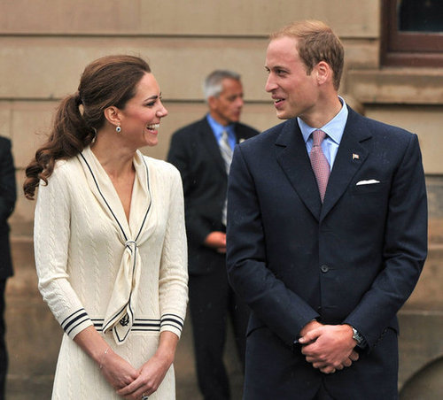 They shared a private joke while in Charlottetown, Canada, in July 2011. For the occasion, Kate chose an Alexander McQueen sailor-inspired dress and navy pumps.
They shared a private joke while in Charlottetown, Canada, in July 2011. For the occasion, Kate chose an Alexander McQueen sailor-inspired dress and navy pumps.