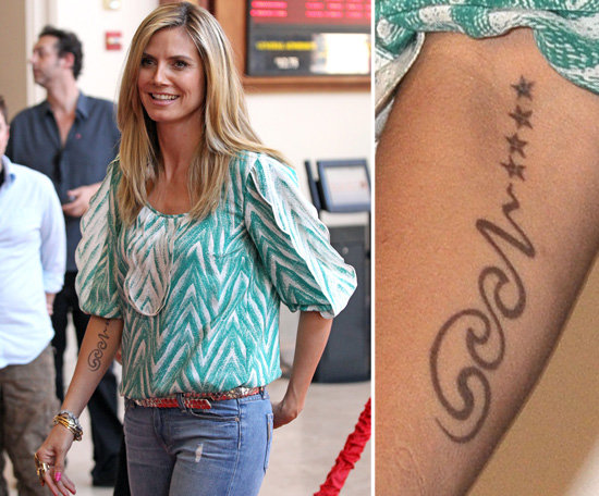 Heidi Klum had "Seal" and four stars, one for each of her children, tattooed on the inside of her left arm in 2008 to commemorate her fourth wedding anniversary with her then-husband, Seal.
Heidi Klum had "Seal" and four stars, one for each of her children, tattooed on the inside of her left arm in 2008 to commemorate her fourth wedding anniversary with her then-husband, Seal.