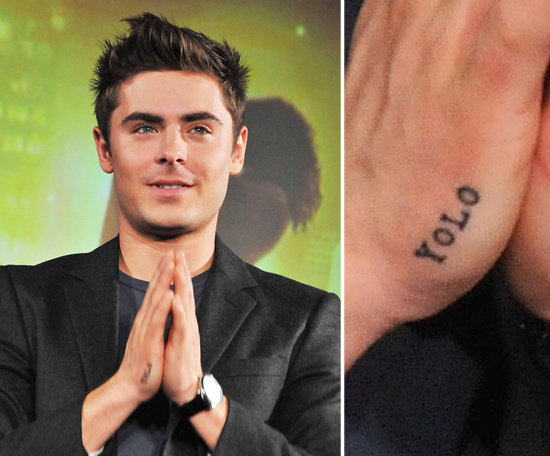 Zac Efron surprised Tokyo fans in December 2011 with a newly inked motto "YOLO," which stands for "you only live once," on his right hand.
Zac Efron surprised Tokyo fans in December 2011 with a newly inked motto "YOLO," which stands for "you only live once," on his right hand.