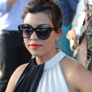 A Pregnant Kourtney Kardashian Wearing Orange Lipstick
