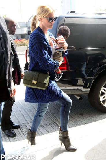 Charlize Theron carried son Jackson into the airport in LA.
Charlize Theron carried son Jackson into the airport in LA.