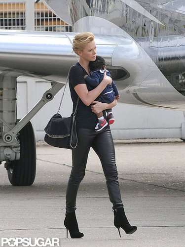 Charlize Theron wore her hair swept back for the flight.
Charlize Theron wore her hair swept back for the flight.