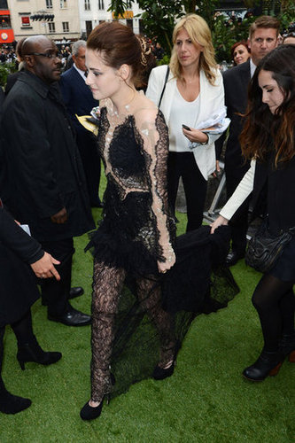 As she moved, she needed a little help with the dramatic lace skirt and train.
As she moved, she needed a little help with the dramatic lace skirt and train.
