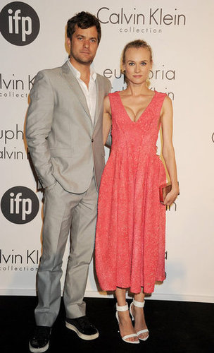 What a gorgeous couple! Diane Kruger arrived at the Calvin Klein Women in Film party with boyfriend Joshua Jackson and looked Spring-perfect in a tea-length coral Calvin Klein creation and white Givenchy sandals.
What a gorgeous couple! Diane Kruger arrived at the Calvin Klein Women in Film party with boyfriend Joshua Jackson and looked Spring-perfect in a tea-length coral Calvin Klein creation and white Givenchy sandals.
