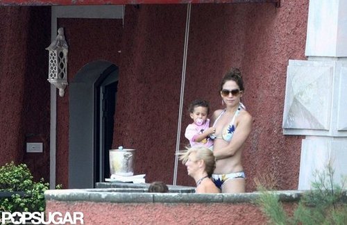 Jennifer Lopez showed off her bikini body with baby Emme on her hip during an August 2009 trip to Italy.
Jennifer Lopez showed off her bikini body with baby Emme on her hip during an August 2009 trip to Italy.