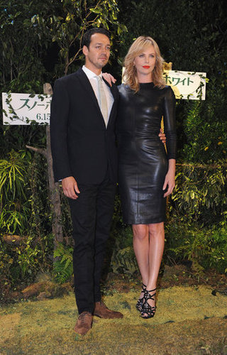 Charlize Theron attended the Tokyo press conference in a sexy fitted leather sheath by The Row. To keep the vampy look intact, she finished the look with Dior sandals and a bright red lip.
Charlize Theron attended the Tokyo press conference in a sexy fitted leather sheath by The Row. To keep the vampy look intact, she finished the look with Dior sandals and a bright red lip.