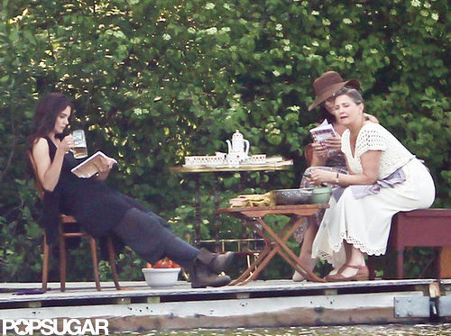 Katie Holmes pretended to read a book while on set shooting her next film.
Katie Holmes pretended to read a book while on set shooting her next film.