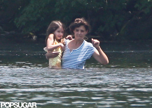 Katie Holmes carried Suri Cruise while taking a dip in a pond in Kent, CT.
Katie Holmes carried Suri Cruise while taking a dip in a pond in Kent, CT.