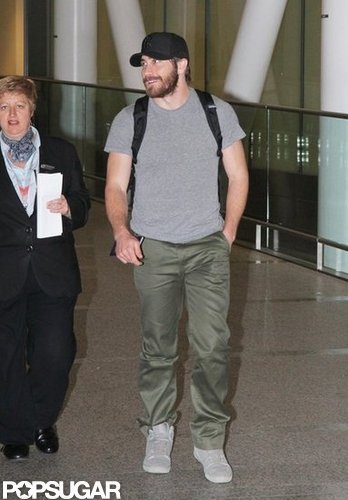 Jake Gyllenhaal gave a smile while walking through the Toronto airport.
Jake Gyllenhaal gave a smile while walking through the Toronto airport.