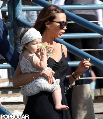 Victoria Beckham carried daughter Harper Beckham.
Victoria Beckham carried daughter Harper Beckham.