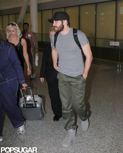 Jake Gyllenhaal wore a hat as he arrived at the Toronto airport.
Jake Gyllenhaal wore a hat as he arrived at the Toronto airport.