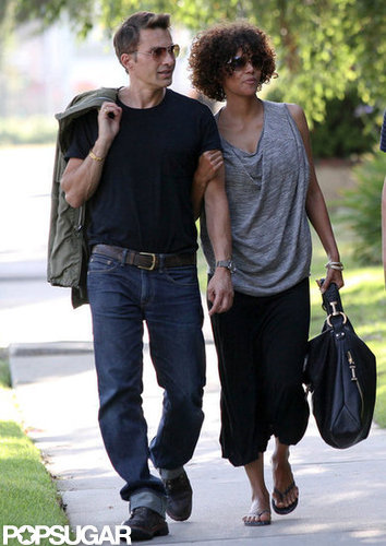 Halle Berry held on to Olivier Martinez's arm as he led the way in LA in May 2012.
Halle Berry held on to Olivier Martinez's arm as he led the way in LA in May 2012.