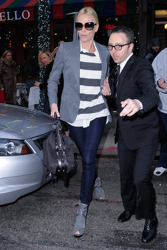 To lighten up a tailored silhouette, just add stripes — Charlize's off-duty attire here showcases it perfectly.
To lighten up a tailored silhouette, just add stripes — Charlize's off-duty attire here showcases it perfectly.