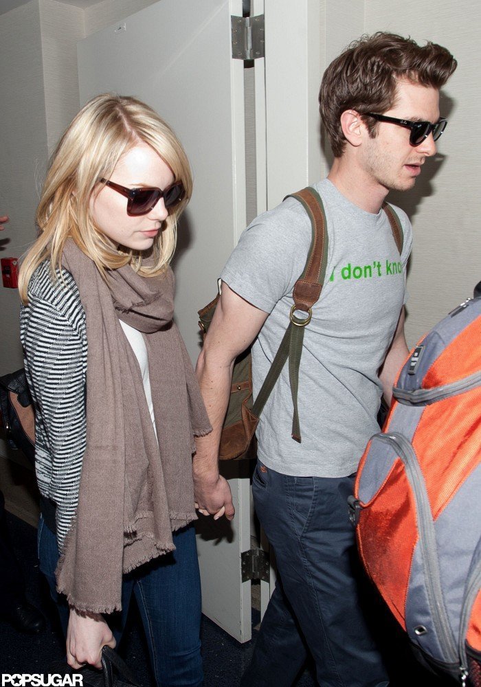 Andrew Garfield and Emma Stone held hands at LAX. Andrew Garfield and Emma Stone held hands at LAX.