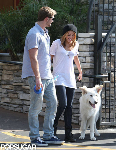 Miley Cyrus and Liam Hemsworth took their dog for a walk around LA in June 2010.
Miley Cyrus and Liam Hemsworth took their dog for a walk around LA in June 2010.
