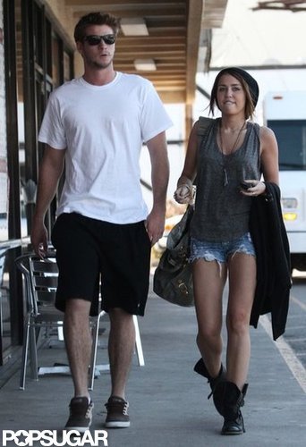 In March 2010, Miley Cyrus and Liam Hemsworth got sushi in LA.
In March 2010, Miley Cyrus and Liam Hemsworth got sushi in LA.