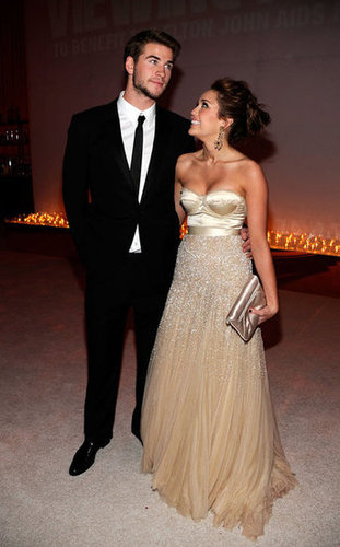 Miley Cyrus and Liam Hemsworth had a look of love at the Elton John AIDS Foundation Academy Award party in March 2010.
Miley Cyrus and Liam Hemsworth had a look of love at the Elton John AIDS Foundation Academy Award party in March 2010.