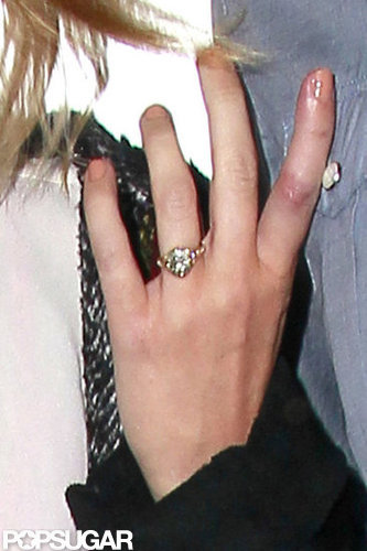 Miley Cyrus wore her engagement ring to catch a flight out of LAX.
Miley Cyrus wore her engagement ring to catch a flight out of LAX.