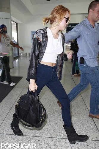Miley Cyrus was escorted through LAX.
Miley Cyrus was escorted through LAX.