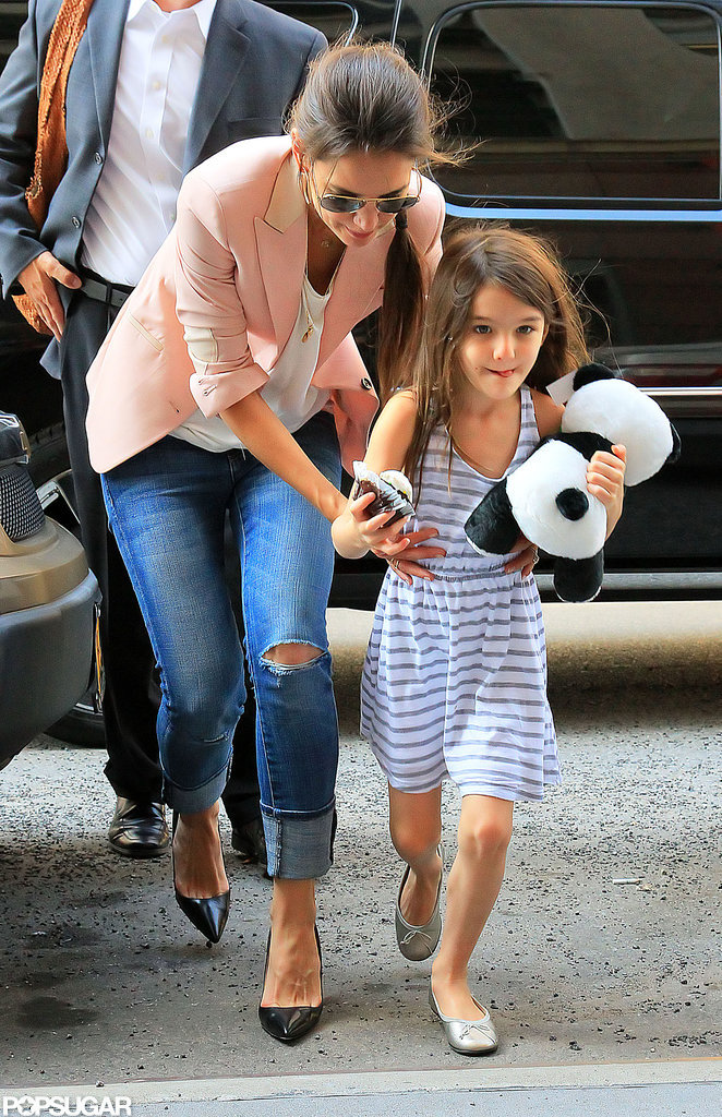 Suri Cruise and Katie Holmes headed to Jacques Torres Chocolatier. Suri Cruise and Katie Holmes headed to Jacques Torres Chocolatier.