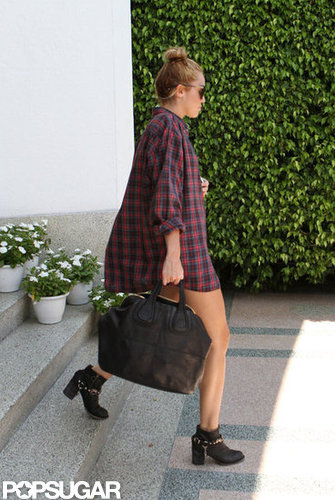Miley Cyrus checked out of her hotel in Miami.
Miley Cyrus checked out of her hotel in Miami.