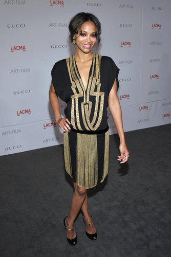 Channeling a chic version of flapper style, Zoe wore a black and gold Gucci drop-waist dress with Gucci T-strap heels to a LACMA Art + Film gala in November 2011.
Channeling a chic version of flapper style, Zoe wore a black and gold Gucci drop-waist dress with Gucci T-strap heels to a LACMA Art + Film gala in November 2011.