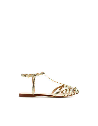 These gilded sandals put a sophisticated spin on the jellies we loved growing up.
Zara Plaited Jelly Shoe ($50)
These gilded sandals put a sophisticated spin on the jellies we loved growing up.
Zara Plaited Jelly Shoe ($50)