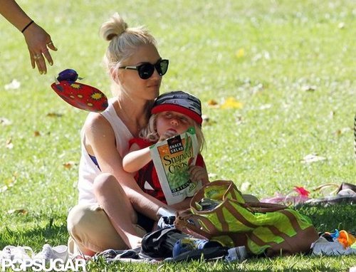 Gwen Stefani held Zuma in her lap while he snacked.
Gwen Stefani held Zuma in her lap while he snacked.