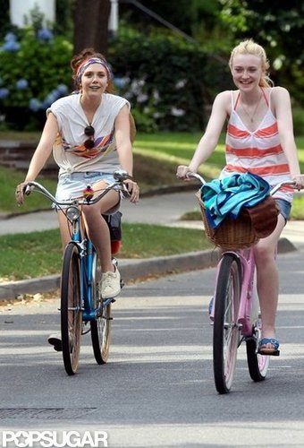 Elizabeth Olsen and Dakota Fanning rode bikes through the streets of NYC.
Elizabeth Olsen and Dakota Fanning rode bikes through the streets of NYC.