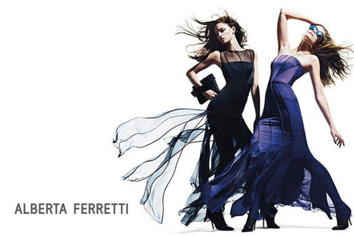 Models strike a wind-blown pose for Alberta Ferretti's Fall '12 campaign.
Models strike a wind-blown pose for Alberta Ferretti's Fall '12 campaign.