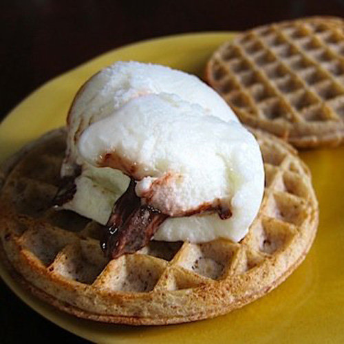 This Summer has been a scorcher, so why not cool off with this recipe for whole grain waffles topped with frozen yogurt? This icy topping is the perfect alternative to sugar-laden syrup. Who says a diet can't be delicious?
This Summer has been a scorcher, so why not cool off with this recipe for whole grain waffles topped with frozen yogurt? This icy topping is the perfect alternative to sugar-laden syrup. Who says a diet can't be delicious?