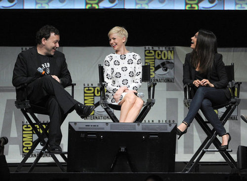 Michelle Williams and Mila Kunis laughed with Sam Raimi onstage at at Comic-Con.
Michelle Williams and Mila Kunis laughed with Sam Raimi onstage at at Comic-Con.