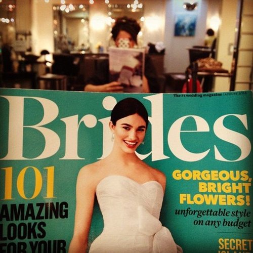 Bride-to-be karlibulnes is a multitasking reader. She writes, "Reading bridal mags while I still can and getting my hair did."
Bride-to-be karlibulnes is a multitasking reader. She writes, "Reading bridal mags while I still can and getting my hair did."