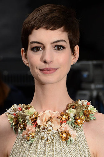 Anne Hathaway showed off her short hair at the Dark Knight Rises premiere.
Anne Hathaway showed off her short hair at the Dark Knight Rises premiere.