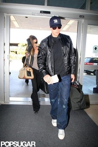 Tom Brady and Gisele Bündchen were loved up at LAX in March 2009.
Tom Brady and Gisele Bündchen were loved up at LAX in March 2009.