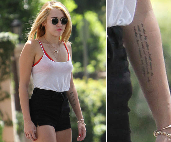 Miley Cyrus added an inscription to the inside of her left forearm that reads: "So that his place shall never be with those cold and timid souls who knew neither victory nor defeat." The quote is from a speech given by President Theodore Roosevelt in 1910.
Miley Cyrus added an inscription to the inside of her left forearm that reads: "So that his place shall never be with those cold and timid souls who knew neither victory nor defeat." The quote is from a speech given by President Theodore Roosevelt in 1910.