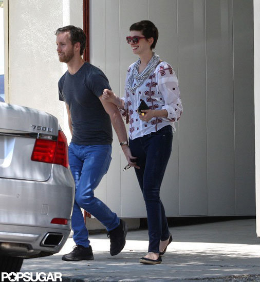 Adam Shulman led the way for Anne Hathaway coming out of a furniture store in LA. Adam Shulman led the way for Anne Hathaway coming out of a furniture store in LA.