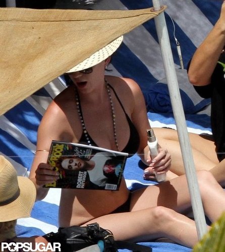 Katy Perry Wears a Bikini and Reads Up on Rob Pattinson Katy Perry Wears a Bikini and Reads Up on Rob Pattinson