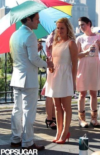 Amy Poehler Gets Close With Pal Paul and Son Archie on Set Amy Poehler Gets Close With Pal Paul and Son Archie on Set