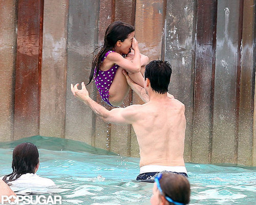 Suri Cruise played in the water with Tom Cruise.
Suri Cruise played in the water with Tom Cruise.