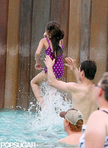 Suri Cruise and Tom Cruise played at a water park in Orlando.
Suri Cruise and Tom Cruise played at a water park in Orlando.
