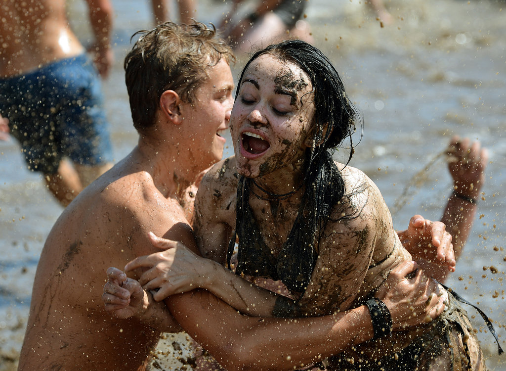 A twosome got down and dirty at Woodstock Festival Poland in Kostrzyn nad Odra.
A twosome got down and dirty at Woodstock Festival Poland in Kostrzyn nad Odra.