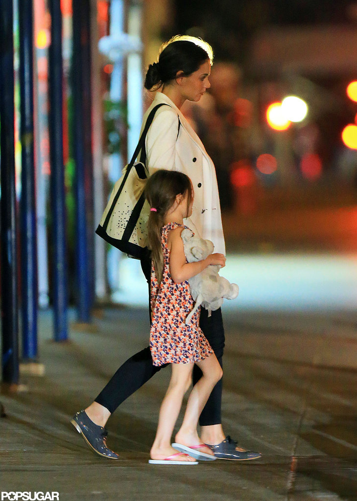 Katie Holmes held Suri's hand on their way into dinner at Nobu.
Katie Holmes held Suri's hand on their way into dinner at Nobu.