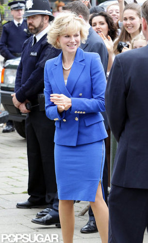 Naomi Watts donned a blue suit jacket with a skirt while filming on set.
Naomi Watts donned a blue suit jacket with a skirt while filming on set.