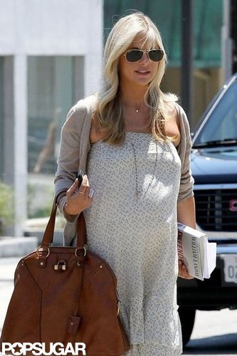 Sarah Michelle Gellar wore a light sweater with her dress.
Sarah Michelle Gellar wore a light sweater with her dress.