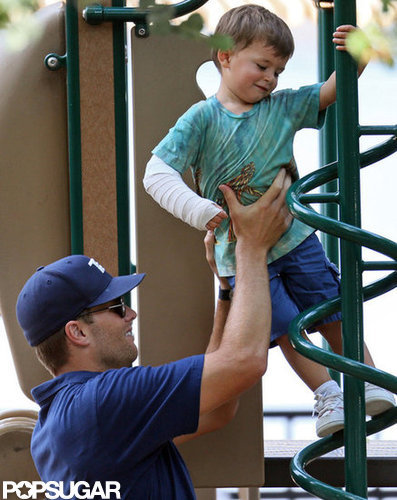 Tom Brady helped Benjamin climb the playground equipment.
Tom Brady helped Benjamin climb the playground equipment.