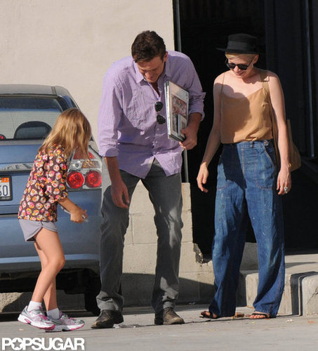 Jason Segel and Matilda Ledger laughed with Michelle Williams in LA.
Jason Segel and Matilda Ledger laughed with Michelle Williams in LA.